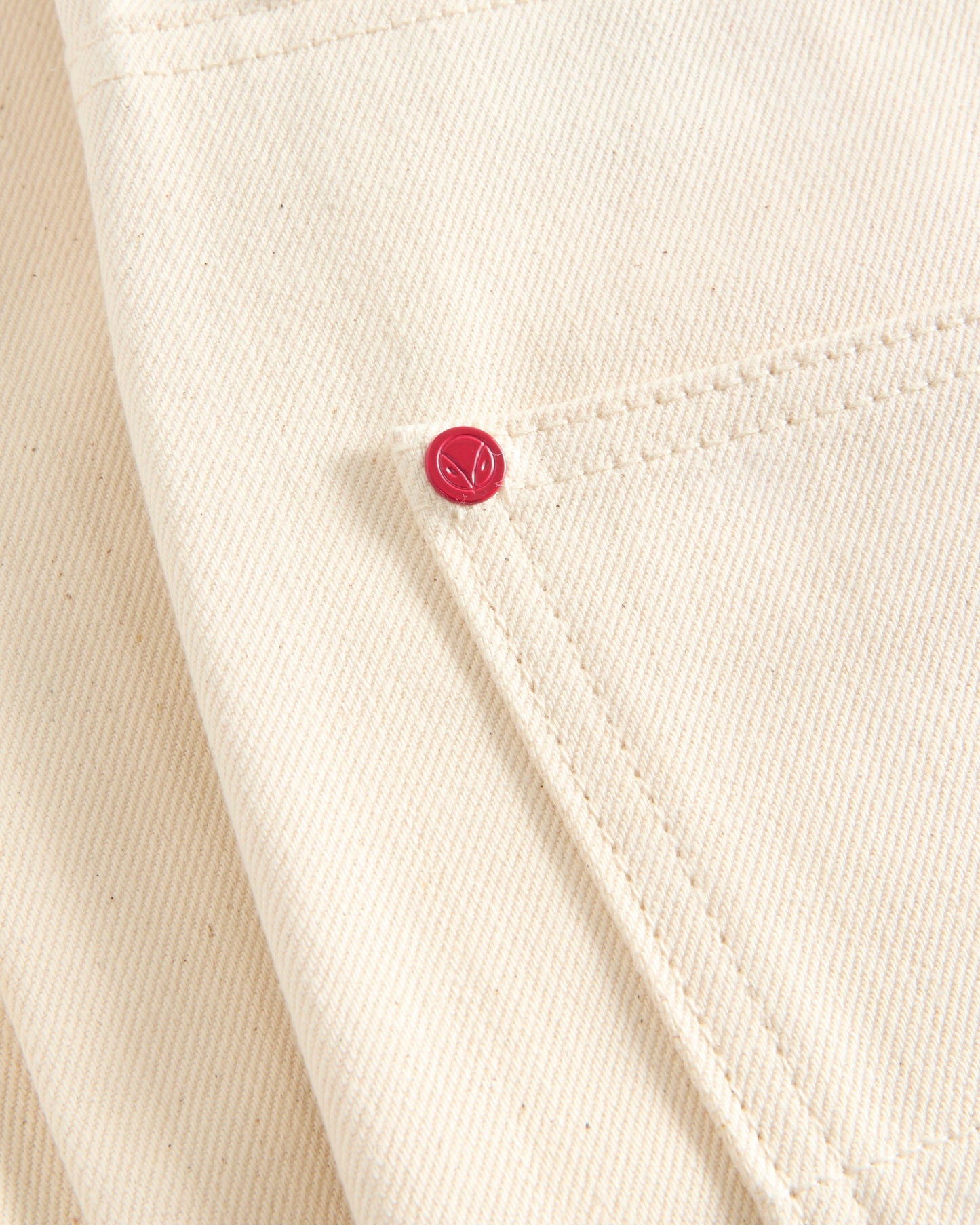 The SlimR - Slim Tapered - Ecru Denim.